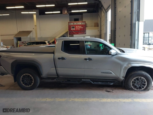 2024 Toyota Tacoma 4WD SR5 with VIN 3TMLB5JN4RM071338, listed as a IAAI auction lot 41742236 with 9,367 mi miles. Bid and sale history available at carsss.com. Image 13.