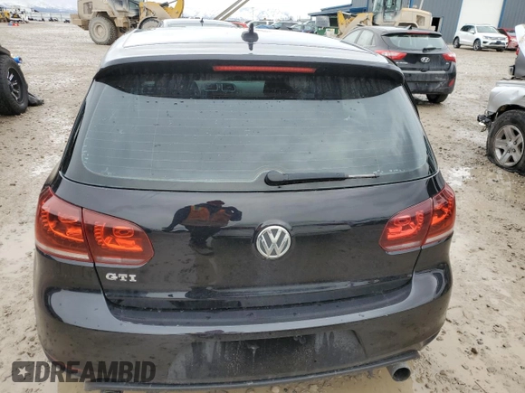 2011 Volkswagen GTI w/Sunroof & Navi PZEV z VIN WVWGD7AJ8BW312571, wystawiony jako Copart lot #45567945 z przebiegiem 155 022 mil mil oraz Szkoda całkowita • Salvage title. Historia ofert i sprzedaży dostępna na DreamBid. Obrazek 6.