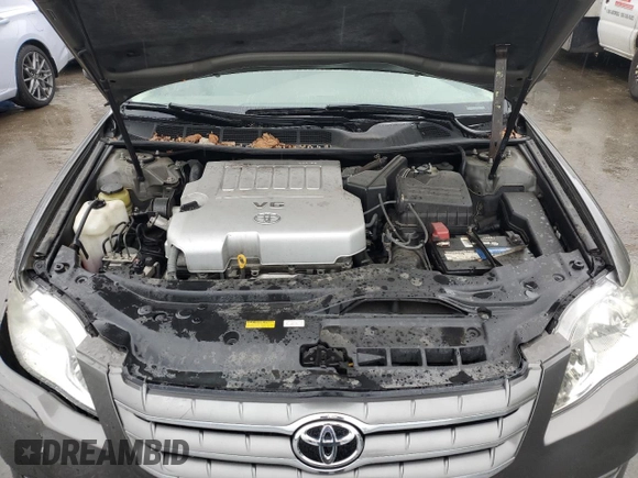 2005 Toyota Avalon XL z VIN 4T1BK36BX5U017137, wystawiony jako Copart lot #57623495 z przebiegiem 130 875 mil mil oraz Szkoda całkowita • Salvage title. Historia ofert i sprzedaży dostępna na DreamBid. Obrazek 11.