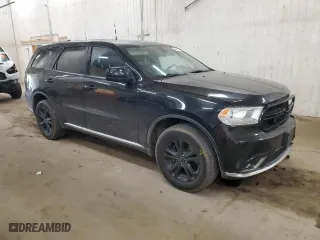 2015 Dodge Durango Special Service with VIN 1C4RDJFG2FC193572, listed as a Copart auction lot 48817575 with 210,420 mi miles and Salvage Title. Bid and sale history available at carsss.com. Image 4.