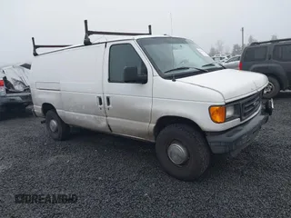 2005 Ford Econoline Cargo with VIN 1FTNE24L75HA61605, listed as a IAAI auction lot 41344105 with 156,726 mi miles. Bid and sale history available at carsss.com. Image 1.