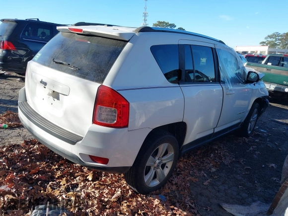 2013 Jeep Compass Sport with VIN 1C4NJCBB0DD116624, listed as a IAAI auction lot 41165639 with 120,164 mi miles. Bid and sale history available at carsss.com. Image 4.