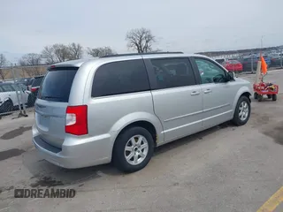 2012 Chrysler Town & Country Touring with VIN 2C4RC1BG5CR157712, listed as a IAAI auction lot 41942939 with 244,799 mi miles. Bid and sale history available at carsss.com. Image 4.