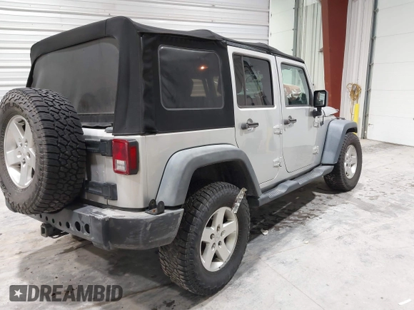 2008 Jeep Wrangler Unlimited X with VIN 1J4GA391X8L647311, listed as a IAAI auction lot 41499620 with 140,601 mi miles and . Bid and sale history available at carsss.com. Image 4.
