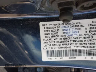 2017 Honda Civic Sedan EX-L with VIN 2HGFC1F77HH642462, listed as a IAAI auction lot 41962942 with 93,277 mi miles. Bid and sale history available at carsss.com. Image 9.