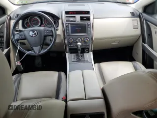 2012 Mazda CX-9 Grand Touring with VIN JM3TB3DV9C0338460, listed as a Copart auction lot 59548495 with 219,060 mi miles and Salvage title. Bid and sale history available at DreamBid. Image 8.