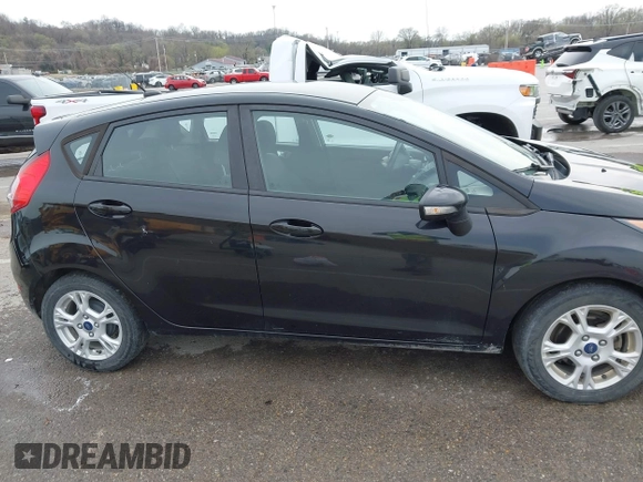 2015 Ford Fiesta SE z VIN 3FADP4EJ3FM115466, wystawiony jako IAAI lot #41849165 z przebiegiem 178 002 mil mil oraz . Historia ofert i sprzedaży dostępna na DreamBid. Obrazek 13.