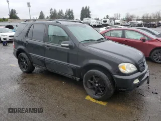 2002 Mercedes-Benz M-Class with VIN 4JGAB54E62A343938, listed as a Copart auction lot 87127184 with 226,811 mi miles and Clean Title. Bid and sale history available at carsss.com. Image 4.