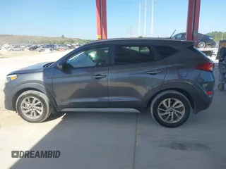 2017 Hyundai Tucson SE with VIN KM8J33A4XHU438510, listed as a IAAI auction lot 42021812 with 117,848 mi miles. Bid and sale history available at carsss.com. Image 14.