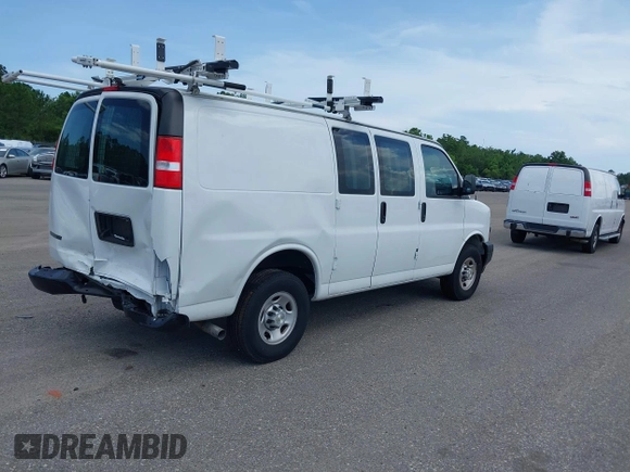 2023 Chevrolet Express Cargo with VIN 1GCWGAFP5P1217550, listed as a IAAI auction lot 42383684 with 9,673 mi miles and . Bid and sale history available at DreamBid. Image 4.