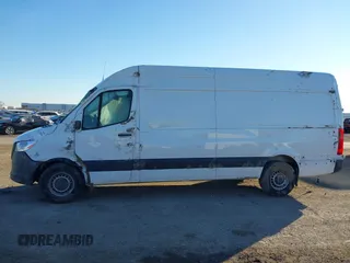 2023 Mercedes-Benz Sprinter Cargo with VIN W1Y4NCHYXPT153665, listed as a IAAI auction lot 41322090 with 203,587 mi miles and . Bid and sale history available at carsss.com. Image 14.