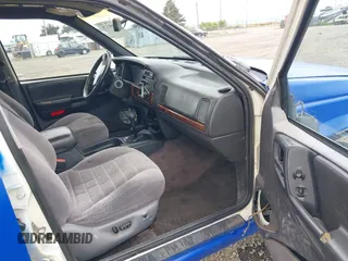 1996 Jeep Grand Cherokee Laredo with VIN 1J4GZ58YXTC329037, listed as a IAAI auction lot 42051175 with 314,571 mi miles and . Bid and sale history available at DreamBid. Image 5.