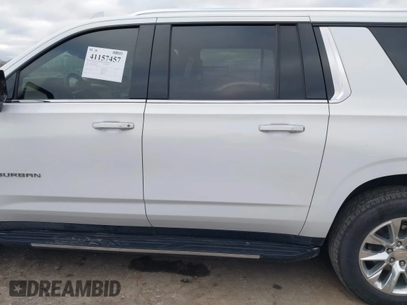 2023 Chevrolet Suburban Premier with VIN 1GNSKFKT1PR529998, listed as a IAAI auction lot 41157457 with 21,551 mi miles and . Bid and sale history available at DreamBid. Image 14.