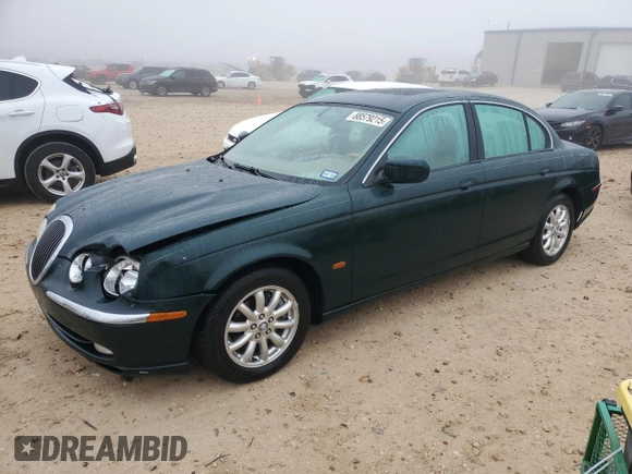 2002 Jaguar S-Type with VIN SAJDA01P12GM27242, listed as a Copart auction lot 88579215 with 218,546 mi miles and Salvage Title. Bid and sale history available at DreamBid. Image 1.