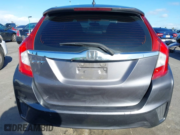 2015 Honda Fit EX-L z VIN 3HGGK5H89FM774299, wystawiony jako IAAI lot #41793448 z przebiegiem 142 228 mil mil oraz . Historia ofert i sprzedaży dostępna na DreamBid. Obrazek 16.