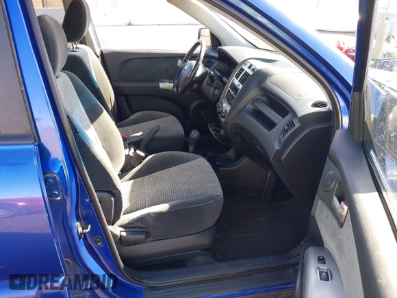 2005 Kia Sportage LX with VIN KNDJF723457057402, listed as a IAAI auction lot 41471742 with 215,565 mi miles and . Bid and sale history available at carsss.com. Image 5.