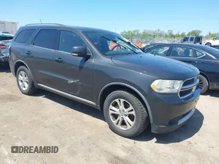 2011 Dodge Durango Crew with VIN 1D4RE4GG4BC599282, listed as a IAAI auction lot 42228048 with 150,514 mi miles and . Bid and sale history available at carsss.com. Image 1.