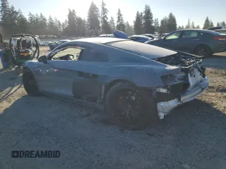 2021 Audi R8 V10 z VIN WUABAAFX8M7900919, wystawiony jako Copart lot #44812725 z przebiegiem 21 390 mil mil oraz Szkoda całkowita • Salvage title. Historia ofert i sprzedaży dostępna na DreamBid. Obrazek 2.