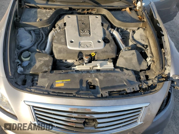 2015 Infiniti Q40 with VIN JN1CV6AR0FM650630, listed as a Copart auction lot 82579604 with 104,324 mi miles and Salvage Title. Bid and sale history available at carsss.com. Image 12.