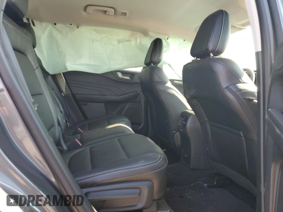 2021 Ford Escape Titanium Plug-In Hybrid z VIN 1FMCU0LZ1MUB17737, wystawiony jako Copart lot #57162592 z przebiegiem Nie podano mil oraz . Historia ofert i sprzedaży dostępna na DreamBid. Obrazek 6.