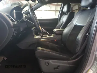 2017 Jeep Grand Cherokee Altitude with VIN 1C4RJFAG9HC772705, listed as a Copart auction lot 61562925 with 184,004 mi miles and Salvage title. Bid and sale history available at DreamBid. Image 7.