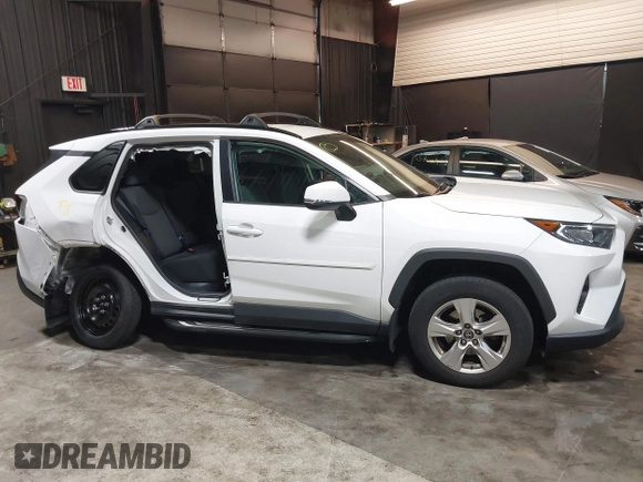 2021 Toyota RAV4 XLE with VIN 2T3P1RFV3MC166504, listed as a IAAI auction lot 42600429 with 63,193 mi miles and . Bid and sale history available at DreamBid. Image 14.