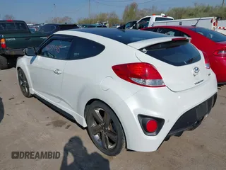 2015 Hyundai Veloster Turbo with VIN KMHTC6AE4FU234611, listed as a IAAI auction lot 42059915 with 107,388 mi miles. Bid and sale history available at carsss.com. Image 3.