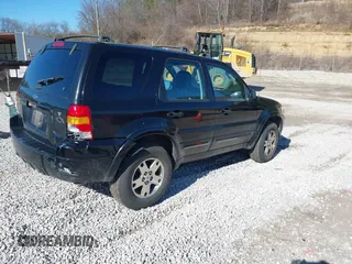 2005 Ford Escape Limited with VIN 1FMCU04155KE23314, listed as a IAAI auction lot 41685671 with 265,731 mi miles and . Bid and sale history available at DreamBid. Image 4.