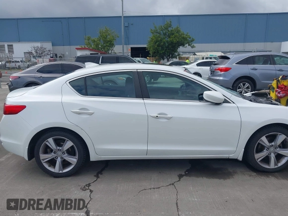 2014 Acura ILX with VIN 19VDE1F34EE000679, listed as a IAAI auction lot 41799014 with 136,514 mi miles. Bid and sale history available at carsss.com. Image 13.