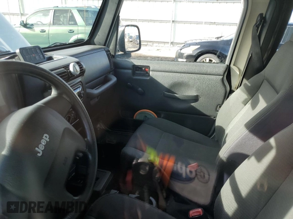 2006 Jeep Wrangler SE with VIN 1J4FA29S76P781617, listed as a Copart auction lot 85903084 with Not Provided miles and Salvage Title. Bid and sale history available at carsss.com. Image 8.