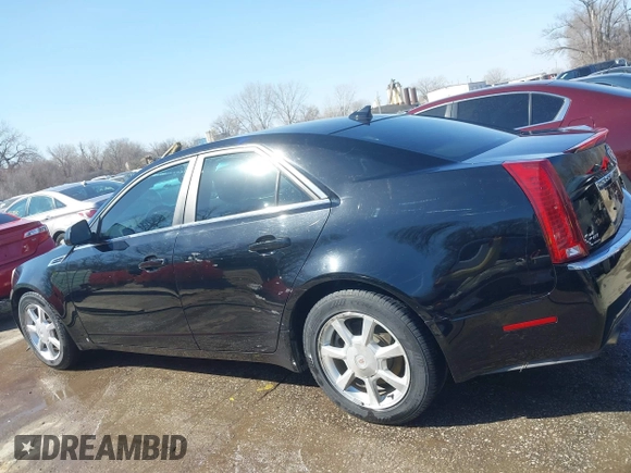 2009 Cadillac CTS AWD z VIN 1G6DH577290166448, wystawiony jako IAAI lot #41751610 z przebiegiem 158 378 mil mil oraz . Historia ofert i sprzedaży dostępna na DreamBid. Obrazek 14.