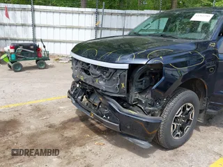 2023 Ford F-150 Lightning Pro with VIN 1FTVW1EL6PWG30061, listed as a IAAI auction lot 42362295 with 22,481 mi miles and . Bid and sale history available at DreamBid. Image 6.