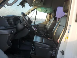 2020 Ford Transit z VIN 1FMZK1C87LKB11433, wystawiony jako Copart lot #85380574 z przebiegiem Nie podano mil oraz Szkoda całkowita • Salvage title. Historia ofert i sprzedaży dostępna na DreamBid. Obrazek 7.