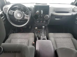 2012 Jeep Wrangler Unlimited Sport with VIN 1C4HJWDG8CL122067, listed as a Copart auction lot 58549805 with 124,658 mi miles and Clean title. Bid and sale history available at DreamBid. Image 8.