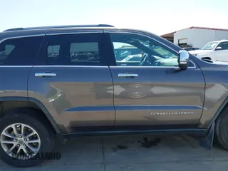 2014 Jeep Grand Cherokee Limited z VIN 1C4RJFBT0EC241030, wystawiony jako IAAI lot #41851316 z przebiegiem 104 344 mil mil oraz . Historia ofert i sprzedaży dostępna na DreamBid. Obrazek 14.