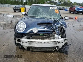 2006 MINI Hardtop S z VIN WMWRE335X6TL20674, wystawiony jako Copart lot #51828915 z przebiegiem Nie podano mil oraz Nie do naprawy • Non repairable. Historia ofert i sprzedaży dostępna na DreamBid. Obrazek 5.