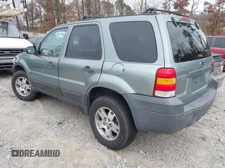 2006 Ford Escape XLT with VIN 1FMYU03Z66KC72563, listed as a IAAI auction lot 41204974 with 249,149 mi miles. Bid and sale history available at carsss.com. Image 3.