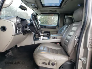 2003 Hummer H2 with VIN 5GRGN23U93H101021, listed as a Copart auction lot 87440524 with 124,826 mi miles and Clean Title. Bid and sale history available at carsss.com. Image 7.