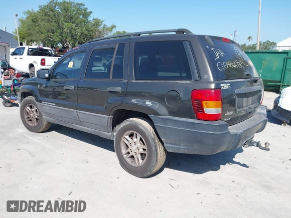 2004 Jeep Grand Cherokee Laredo with VIN 1J4GW48S74C401022, listed as a IAAI auction lot 41982319 with 170,607 mi miles. Bid and sale history available at carsss.com. Image 3.