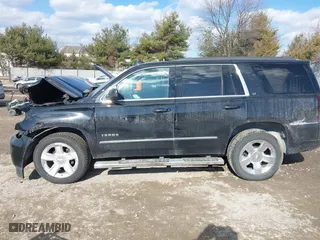 2019 Chevrolet Tahoe LT with VIN 1GNSKBKC9KR336743, listed as a IAAI auction lot 41445798 with 92,274 mi miles. Bid and sale history available at carsss.com. Image 14.
