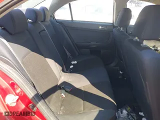 2016 Mitsubishi Lancer ES with VIN JA32U2FU6GU011198, listed as a IAAI auction lot 41932443 with 122,991 mi miles. Bid and sale history available at carsss.com. Image 8.