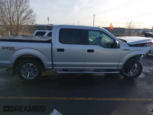 2018 Ford F-150 XL with VIN 1FTEW1EP2JKF28967, listed as a IAAI auction lot 41242743 with 54,171 mi miles. Bid and sale history available at carsss.com. Image 13.