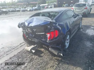 2018 Ford Mustang EcoBoost z VIN 1FA6P8TH2J5164916, wystawiony jako IAAI lot #42091142 z przebiegiem 42 199 mil mil oraz . Historia ofert i sprzedaży dostępna na DreamBid. Obrazek 4.