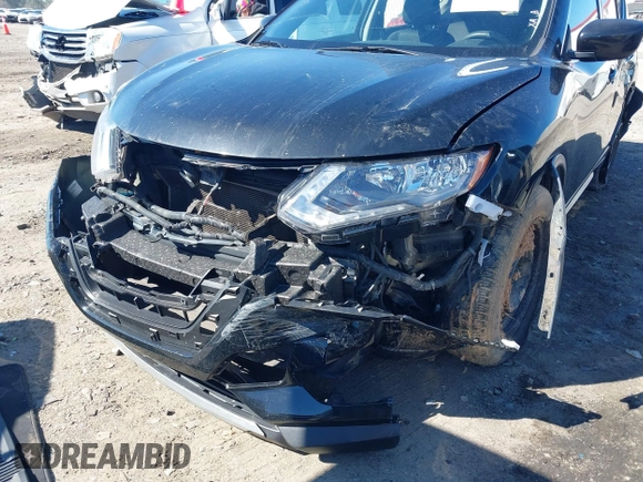 2017 Nissan Rogue SV with VIN KNMAT2MV0HP563632, listed as a IAAI auction lot 41827113 with 193,323 mi miles and . Bid and sale history available at carsss.com. Image 6.