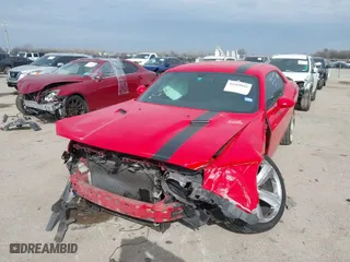 2014 Dodge Challenger SXT with VIN 2C3CDYAG5EH195242, listed as a IAAI auction lot 41569042 with 1 mi miles. Bid and sale history available at carsss.com. Image 2.