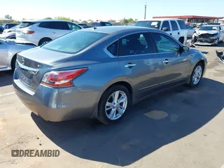2015 Nissan Altima SV with VIN 1N4AL3AP5FC576818, listed as a IAAI auction lot 42129973 with 128,969 mi miles and . Bid and sale history available at carsss.com. Image 4.