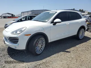 2014 Porsche Cayenne с VIN WP1AA2A28ELA09742, выставлен на аукционе Copart как лот 61779285 с пробегом 182 380 миль миль и Списание • Salvage title. История ставок и продаж доступна на DreamBid. Изображение 1.