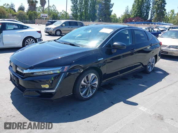 2019 Honda Clarity z VIN JHMZC5F15KC006498, wystawiony jako IAAI lot #42384751 z przebiegiem 368 395 mil mil oraz . Historia ofert i sprzedaży dostępna na DreamBid. Obrazek 17.