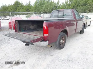 1999 Ford F-150 with VIN 2FTZF1722XCA69178, listed as a IAAI auction lot 42313254 with 197,589 mi miles and . Bid and sale history available at DreamBid. Image 4.