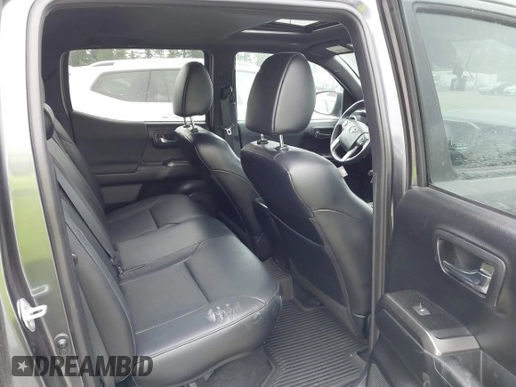 2021 Toyota Tacoma SR5 with VIN 3TMDZ5BN1MM119711, listed as a IAAI auction lot 42479038 with 64,779 mi miles and . Bid and sale history available at DreamBid. Image 8.